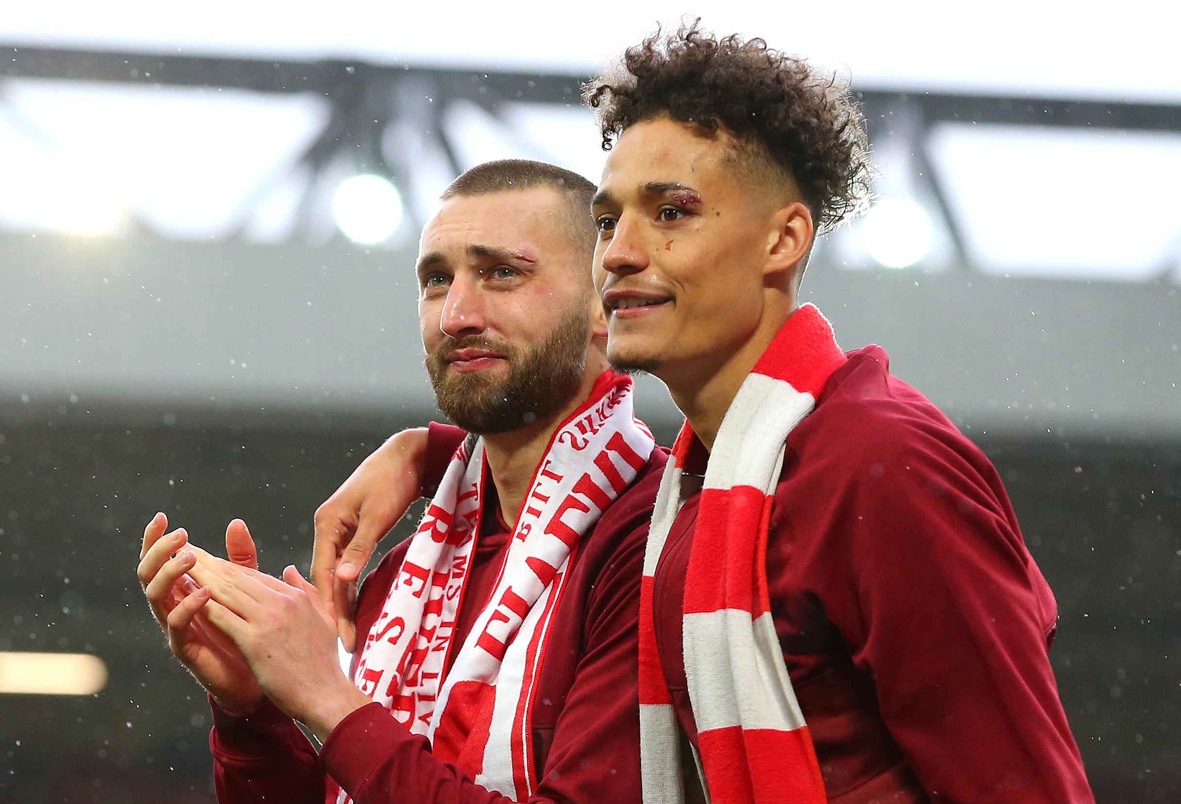 LIVERPOOL, ENGLAND - MAY 23: Nathaniel Phillips and Rhys Williams of Liverpool applauds the fans after the Premier League match between Liverpool and Crystal Palace at Anfield on May 23, 2021 in Liverpool, England.