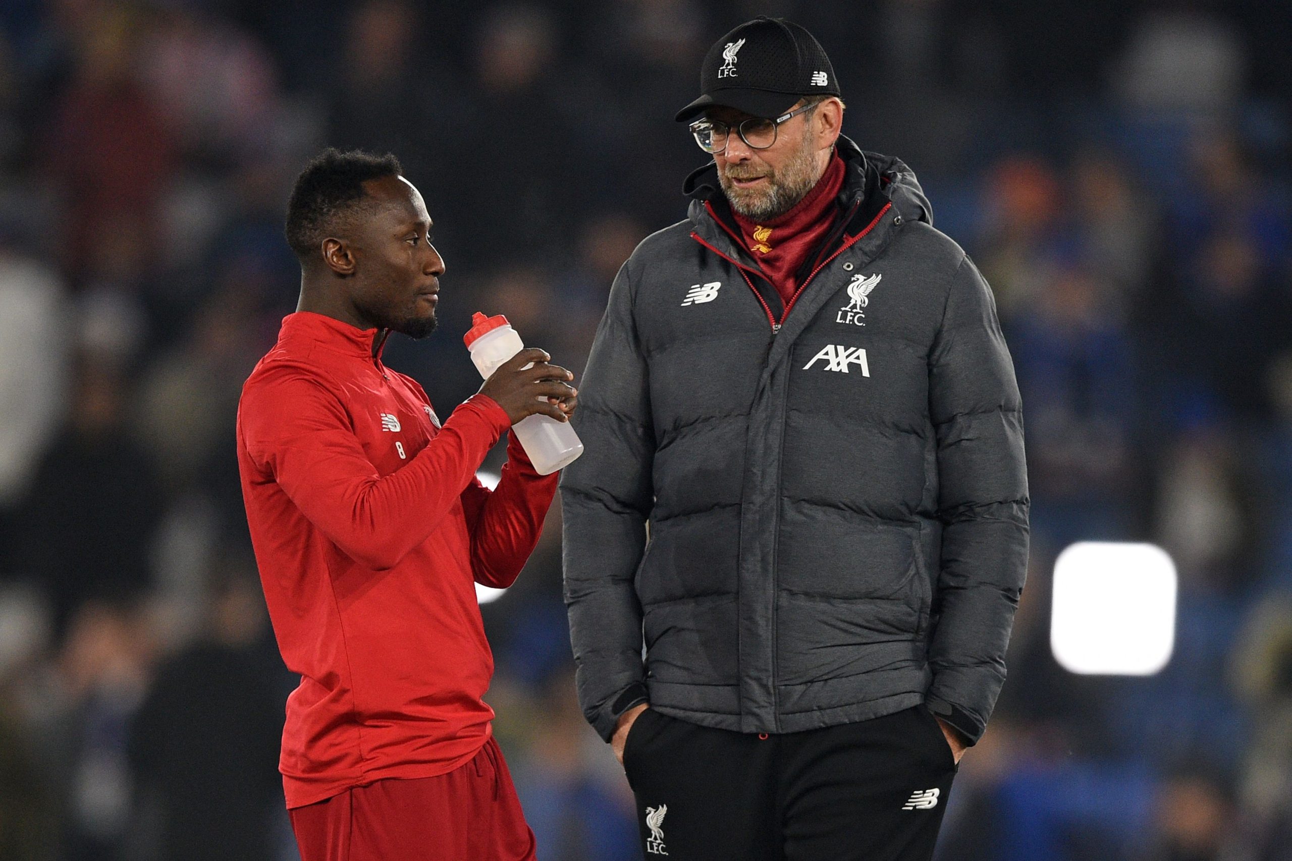 Liverpool's German manager Jurgen Klopp speaks with Liverpool's Guinean midfielder Naby Keita (L) on the pitch before the English Premier League football match between Leicester City and Liverpool at King Power Stadium in Leicester, central England on December 26, 2019.