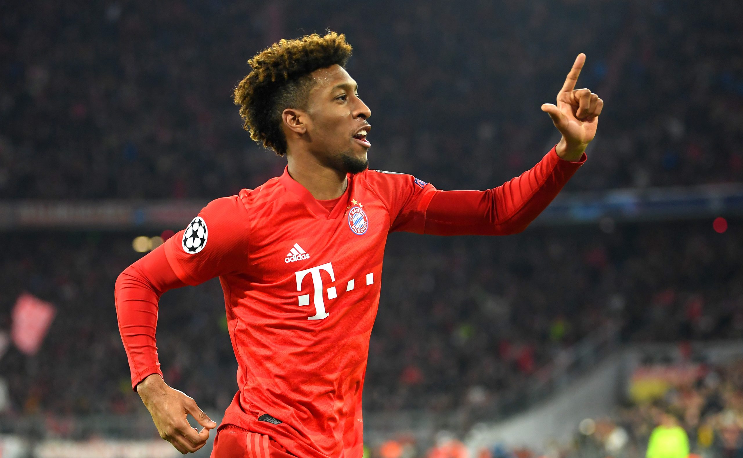 MUNICH, GERMANY - DECEMBER 11: Kingsley Coman of FC Bayern Munich celebrates after scoring his team's first goal during the UEFA Champions League group B match between Bayern Muenchen and Tottenham Hotspur at Allianz Arena on December 11, 2019 in Munich, Germany.