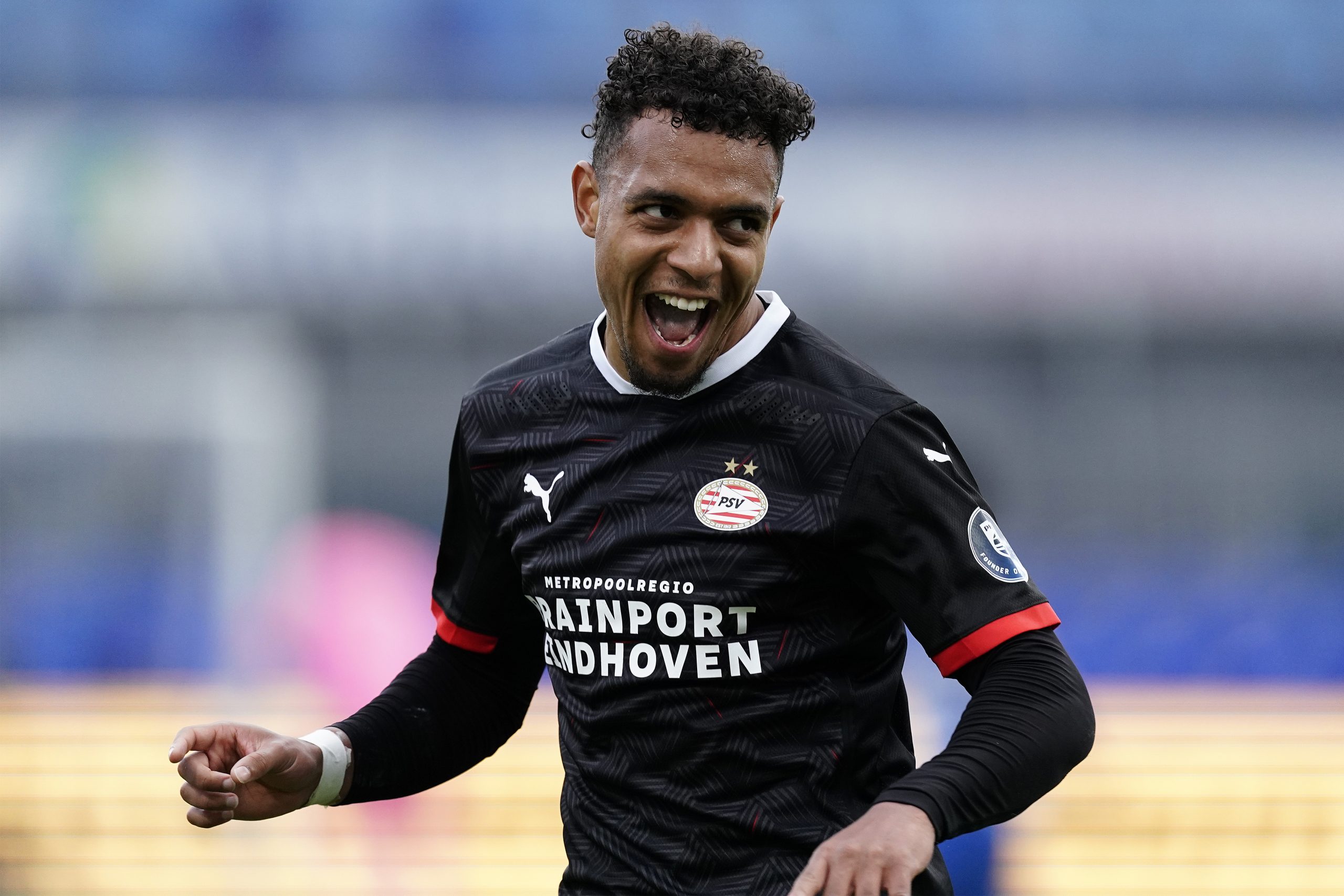 ZWOLLE, NETHERLANDS - OCTOBER 18: Donyell Malen of PSV celebrates 0-3 during the Dutch Eredivisie match between PEC Zwolle v PSV at the MAC3PARK Stadium on October 18, 2020 in Zwolle Netherlands.