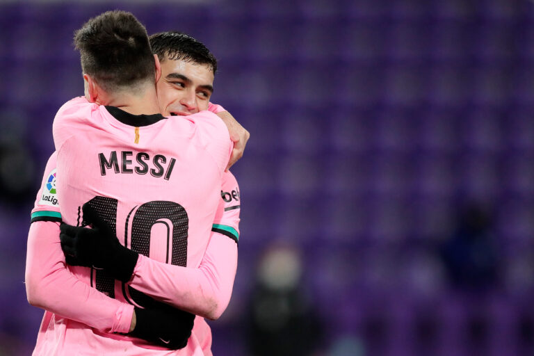 SPAIN - DECEMBER 22: Lionel Messi of FC Barcelona celebrates 0-3 with Pedri of FC Barcelona during the La Liga Santander match between Real Valladolid v FC Barcelona on December 22, 2020 (Photo by David S.