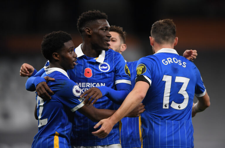 LONDON, ENGLAND - NOVEMBER 01: Tariq Lamptey of Brighton and Hove Albion celebrates with teammates Yves Bissouma and Pascal Gross after scoring his sides first goal during the Premier League match between Tottenham Hotspur and Brighton & Hove Albion at Tottenham Hotspur Stadium on November 01, 2020 in London, England.