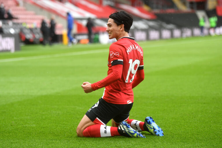 SOUTHAMPTON, ENGLAND - FEBRUARY 20: Takumi Minamino of Southampton celebrates after scoring his team's first goal during the Premier League match between Southampton and Chelsea at St Mary's Stadium on February 20, 2021 in Southampton, England.