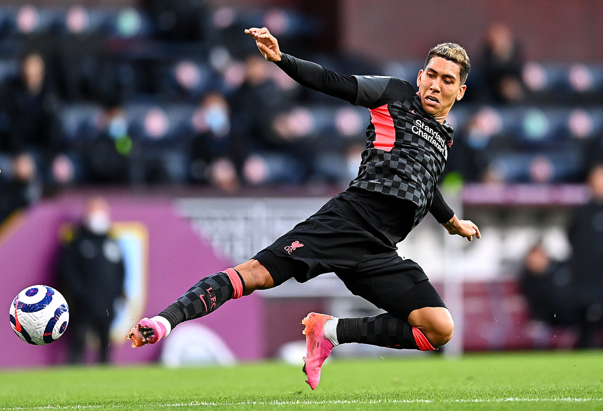BURNLEY, ENGLAND - MAY 19: Roberto Firmino of Liverpool in action during the Premier League match between Burnley and Liverpool at Turf Moor on May 19, 2021 in Burnley, England.