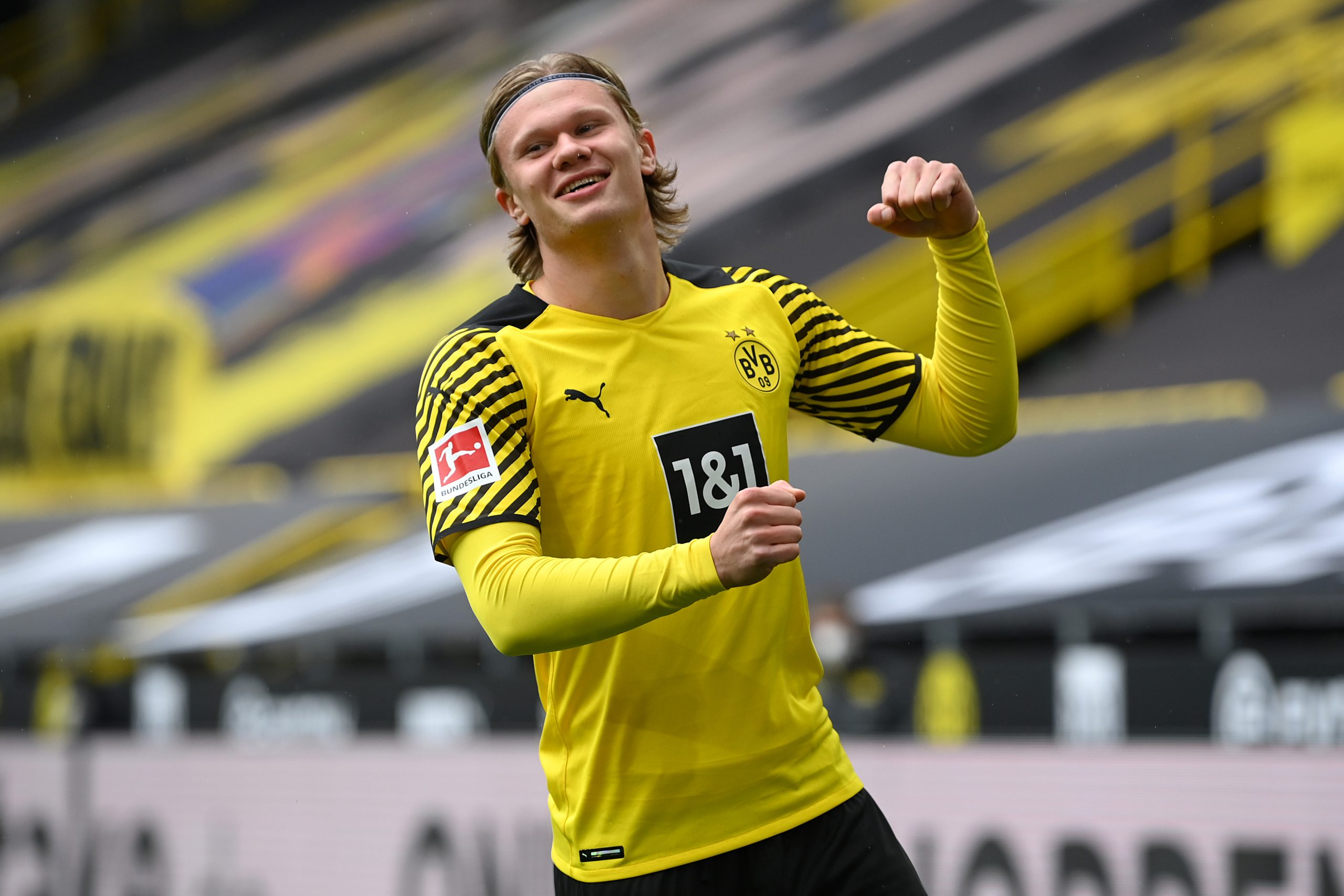 DORTMUND, GERMANY - MAY 22: Erling Haaland of Borussia Dortmund celebrates after scoring their team's first goal during the Bundesliga match between Borussia Dortmund and Bayer 04 Leverkusen at Signal Iduna Park on May 22, 2021 in Dortmund, Germany.