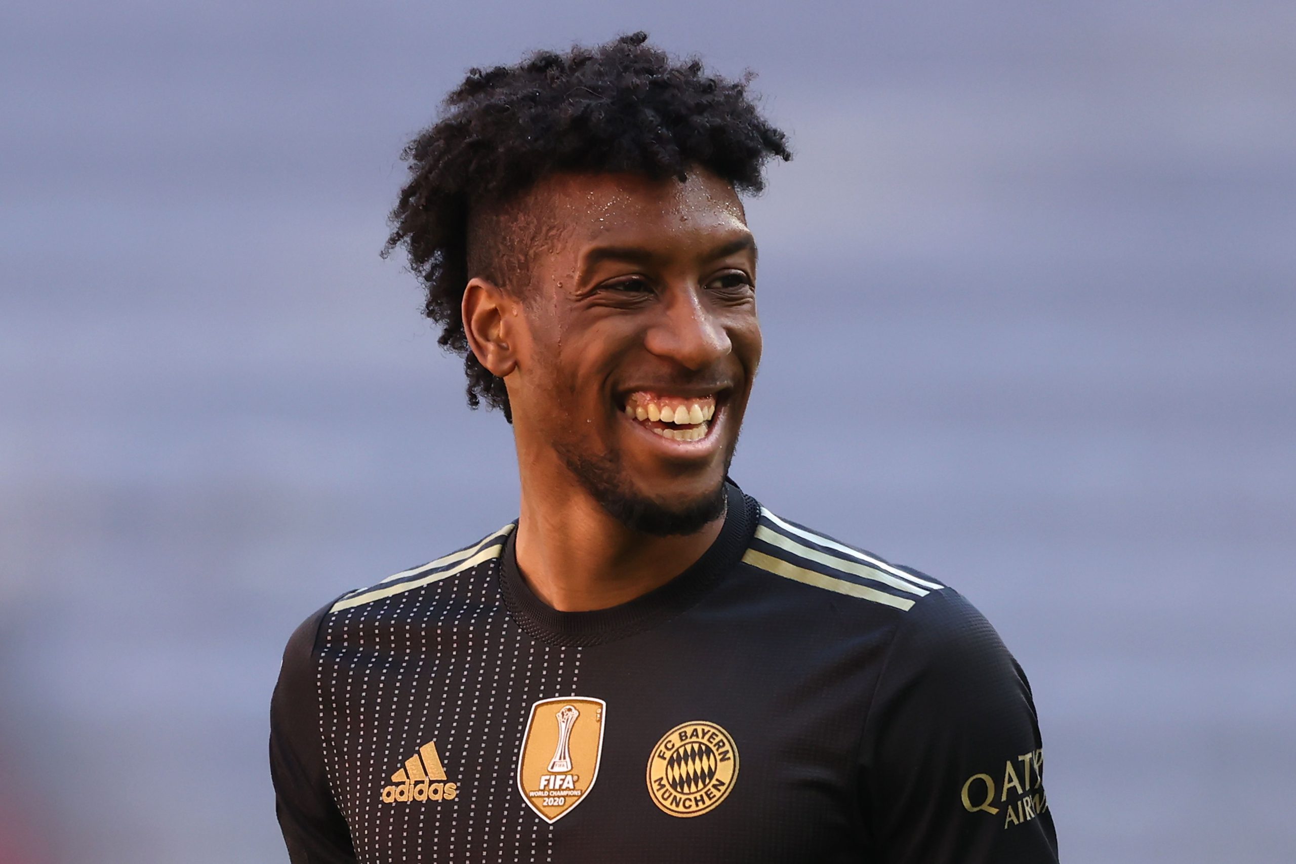 MUNICH, GERMANY - MAY 22: Kingsley Coman of FC Bayern München smiles during the Bundesliga match between FC Bayern Muenchen and FC Augsburg at Allianz Arena on May 22, 2021 in Munich, Germany.