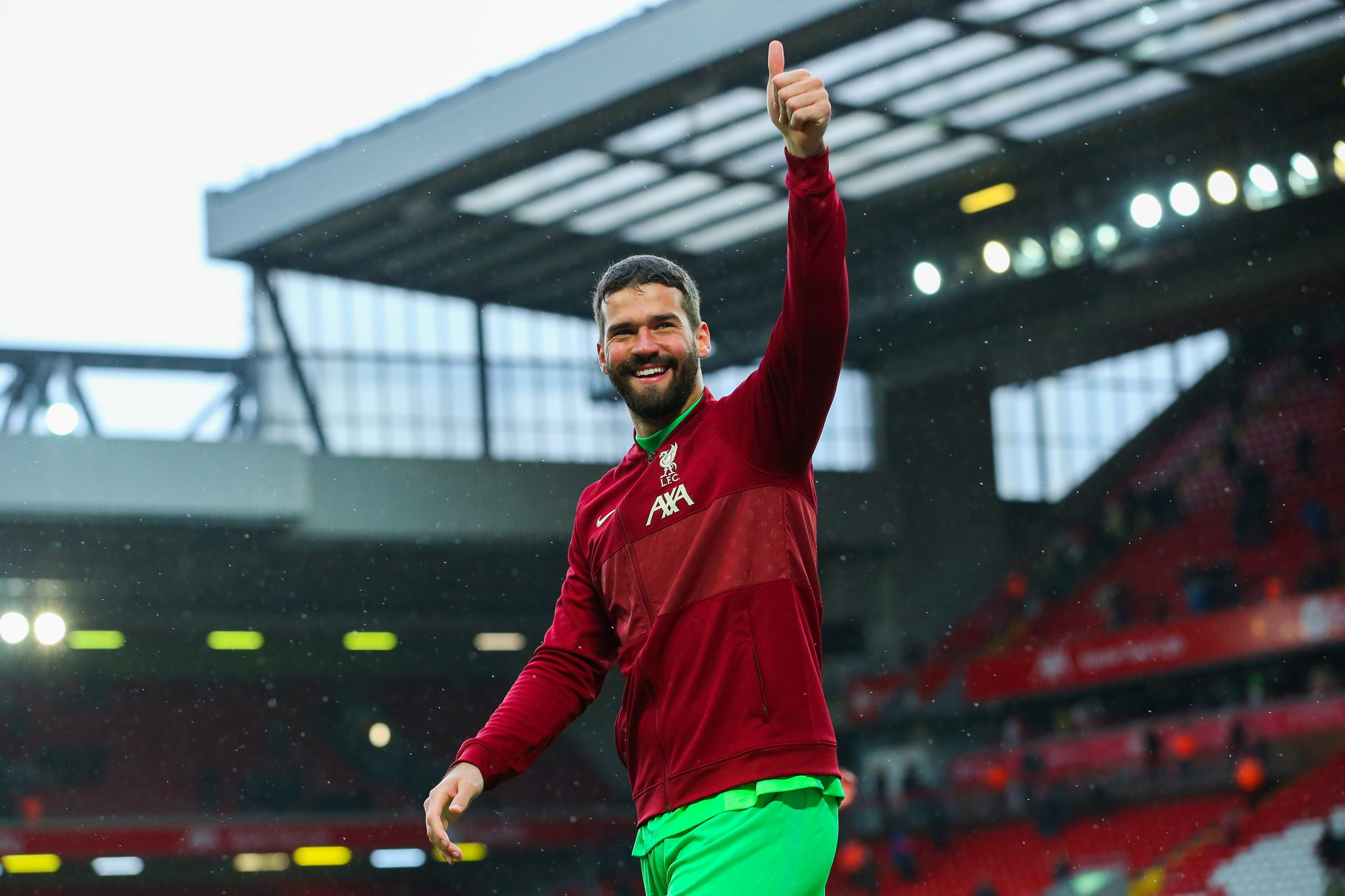 LIVERPOOL, ENGLAND - MAY 23: Alisson of Liverpool acknowledges the fans after the Premier League match between Liverpool and Crystal Palace at Anfield on May 23, 2021 in Liverpool, England.