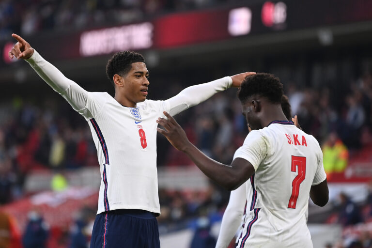 MIDDLESBROUGH, ENGLAND - JUNE 02: Jude Bellingham of England celebrates his side's first goal scored by team mate Bukayo Saka during the international friendly match between England and Austria at Riverside Stadium on June 02, 2021 in Middlesbrough, England.