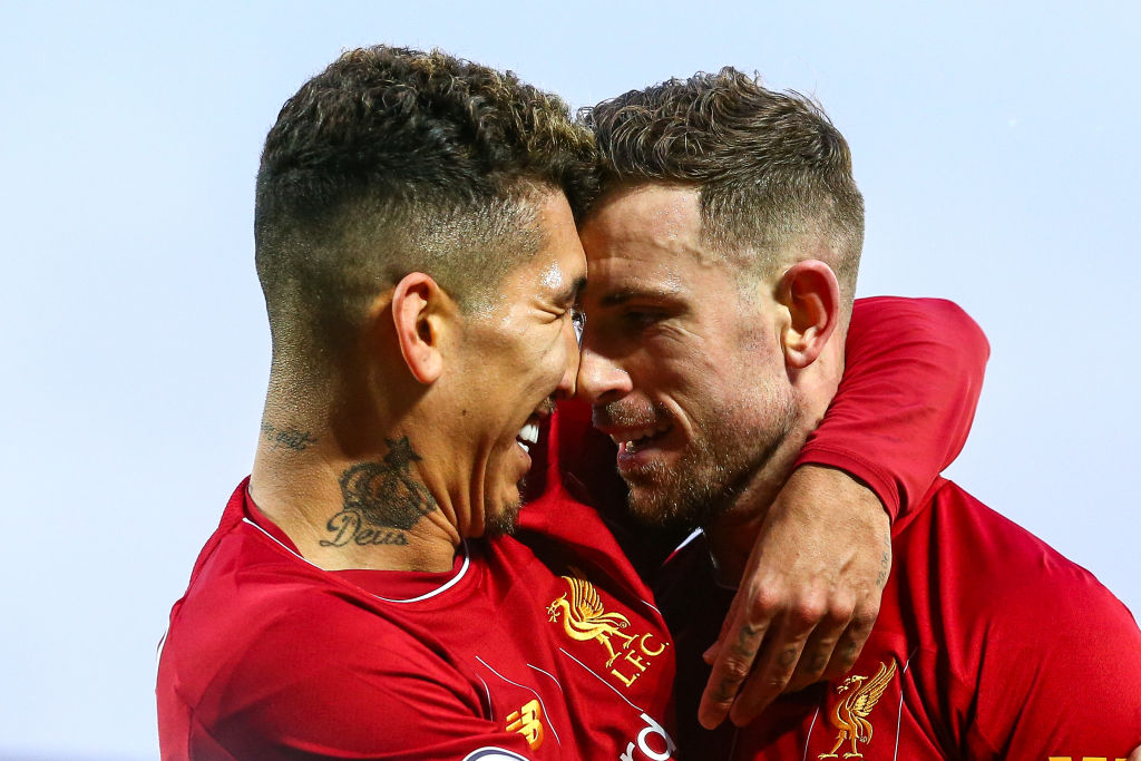 LIVERPOOL, ENGLAND - FEBRUARY 01: Jordan Henderson of Liverpool Celebrates scoring a goal to make it 2-0 with Roberto Firmino of Liverpool during the Premier League match between Liverpool FC and Southampton FC at Anfield on February 1, 2020 in Liverpool, United Kingdom. (Photo by Robbie Jay Barratt - AMA/Getty Images)