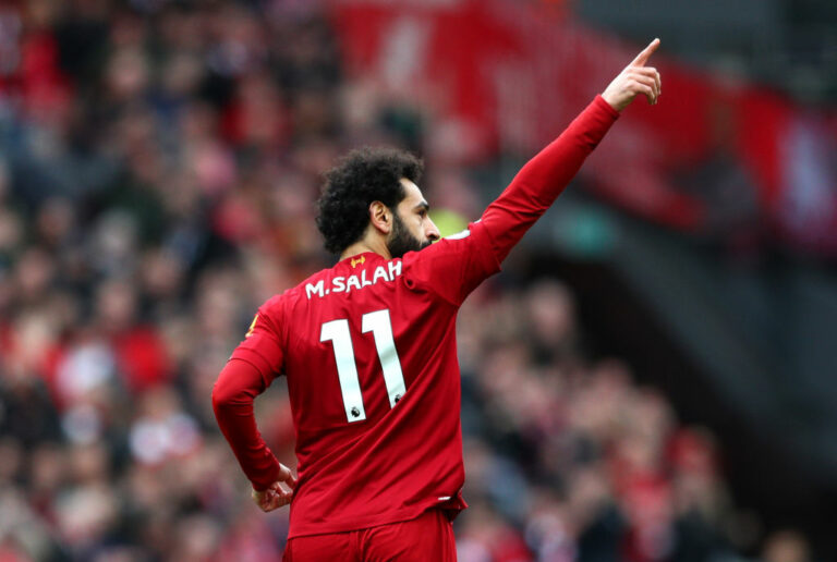 LIVERPOOL, ENGLAND - MARCH 07: Mohamed Salah of Liverpool celebrates after scoring his team's first goal during the Premier League match between Liverpool FC and AFC Bournemouth at Anfield on March 07, 2020 in Liverpool, United Kingdom. (Photo by Jan Kruger/Getty Images)