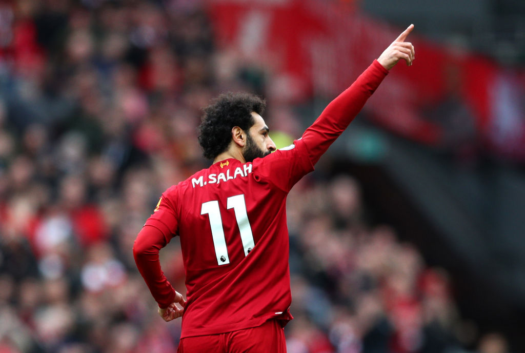 LIVERPOOL, ENGLAND - MARCH 07: Mohamed Salah of Liverpool celebrates after scoring his team's first goal during the Premier League match between Liverpool FC and AFC Bournemouth at Anfield on March 07, 2020 in Liverpool, United Kingdom. (Photo by Jan Kruger/Getty Images)