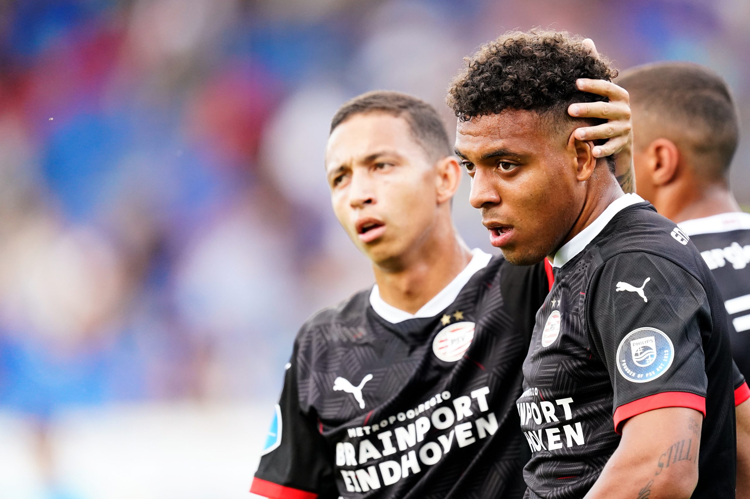 TILBURG, NETHERLANDS - AUGUST 21: Donyell Malen of PSV celebrates 0-1 with Mauro Junior of PSV during the Club Friendly match between Willem II v PSV at the Koning Willem II Stadium on August 21, 2020 in Tilburg Netherlands.