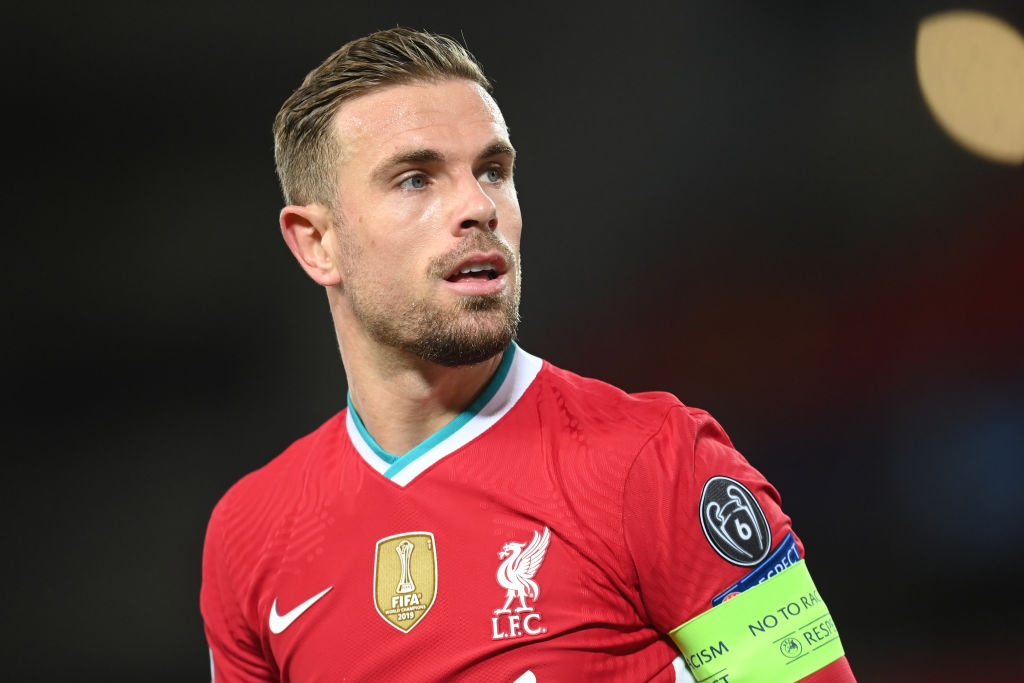 LIVERPOOL, ENGLAND - OCTOBER 27: Jordan Henderson of Liverpool in action during the UEFA Champions League Group D stage match between Liverpool FC and FC Midtjylland at Anfield on October 27, 2020 in Liverpool, England. Sporting stadiums around the UK remain under strict restrictions due to the Coronavirus Pandemic as Government social distancing laws prohibit fans inside venues resulting in games being played behind closed doors. (Photo by Michael Regan/Getty Images)
