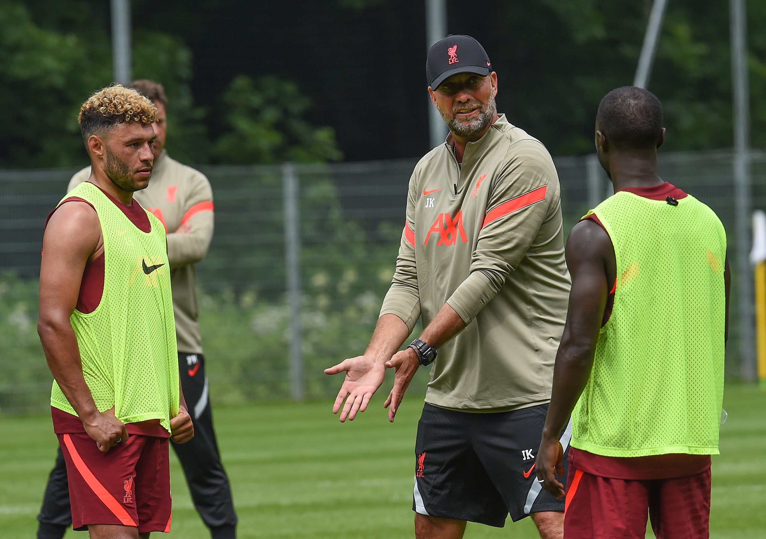 UNSPECIFIED, AUSTRIA - JULY 13: Jurgen Klopp manager of Liverpool talks with Naby Keita and Alex Oxlade-Chamberlain of Liverpool during a training session on July 13, 2021 in UNSPECIFIED, Austria.