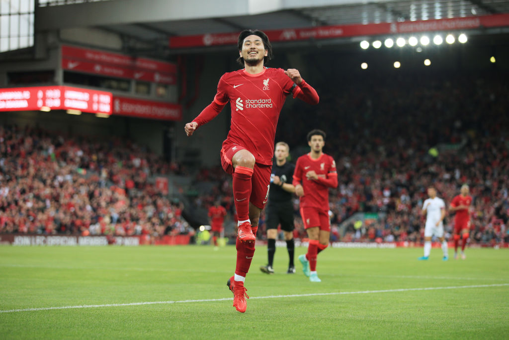 LIVERPOOL, ENGLAND - AUGUST 09: Takumi Minamino of Liverpool celebrates after scoring their 1st goal during the pre-season friendly match between Liverpool and Osasuna at Anfield on August 9, 2021 in Liverpool, England. (Photo by Simon Stacpoole/Offside/Offside via Getty Images)