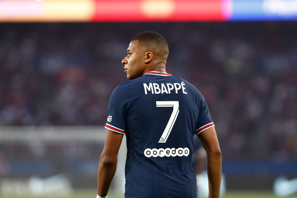 PARIS, FRANCE - AUGUST 14: Kylian Mbappe #7 of Paris Saint-Germain looks on during the Ligue 1 Uber Eats match between Paris Saint Germain and Strasbourg at Parc des Princes on August 14, 2021 in Paris, France. (Photo by Catherine Steenkeste/Getty Images)