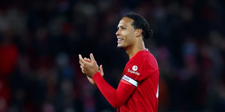 LIVERPOOL, ENGLAND - FEBRUARY 10: Virgil van Dijk of Liverpool applauds the fans after the Premier League match between Liverpool and Leicester City at Anfield on February 10, 2022 in Liverpool, England. (Photo by Clive Brunskill/Getty Images)