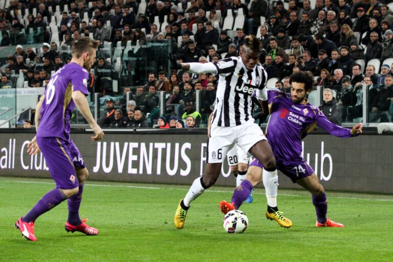 March 5 2015 Turin Italy Juventus midfielder Paul Pogba 6 fights for the ball against Fioren