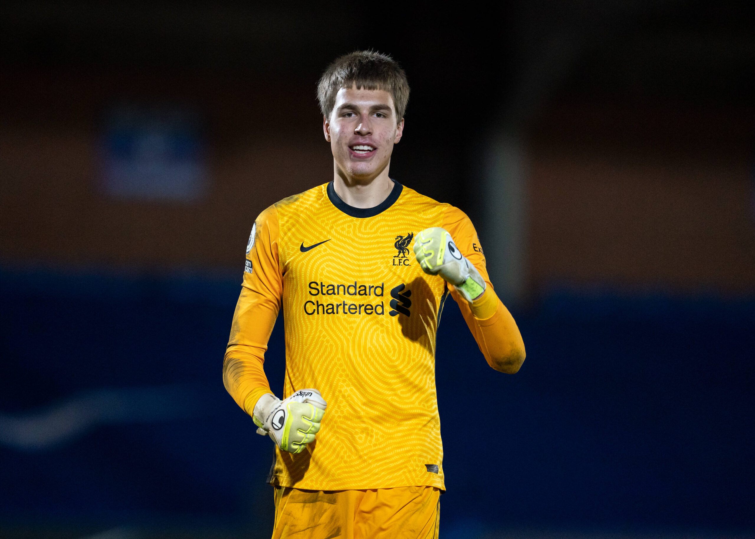 Goalkeeper Jacob Ojrzynski of Liverpool U23 celebrates his teams win during the Premier League 2 behind closed doors mat