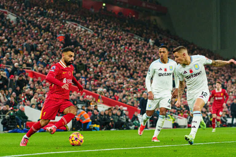 Liverpool FC v Aston Villa FC - Premier League Liverpool s Mohamed Salah competes with Aston Villa s Jacob Ramsey and Lu