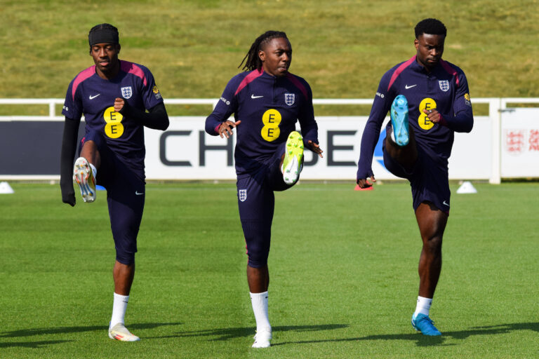 England Training England forward Noni Madueke, England forward Eberechi Eze and England defender Marc Guehi warm up duri